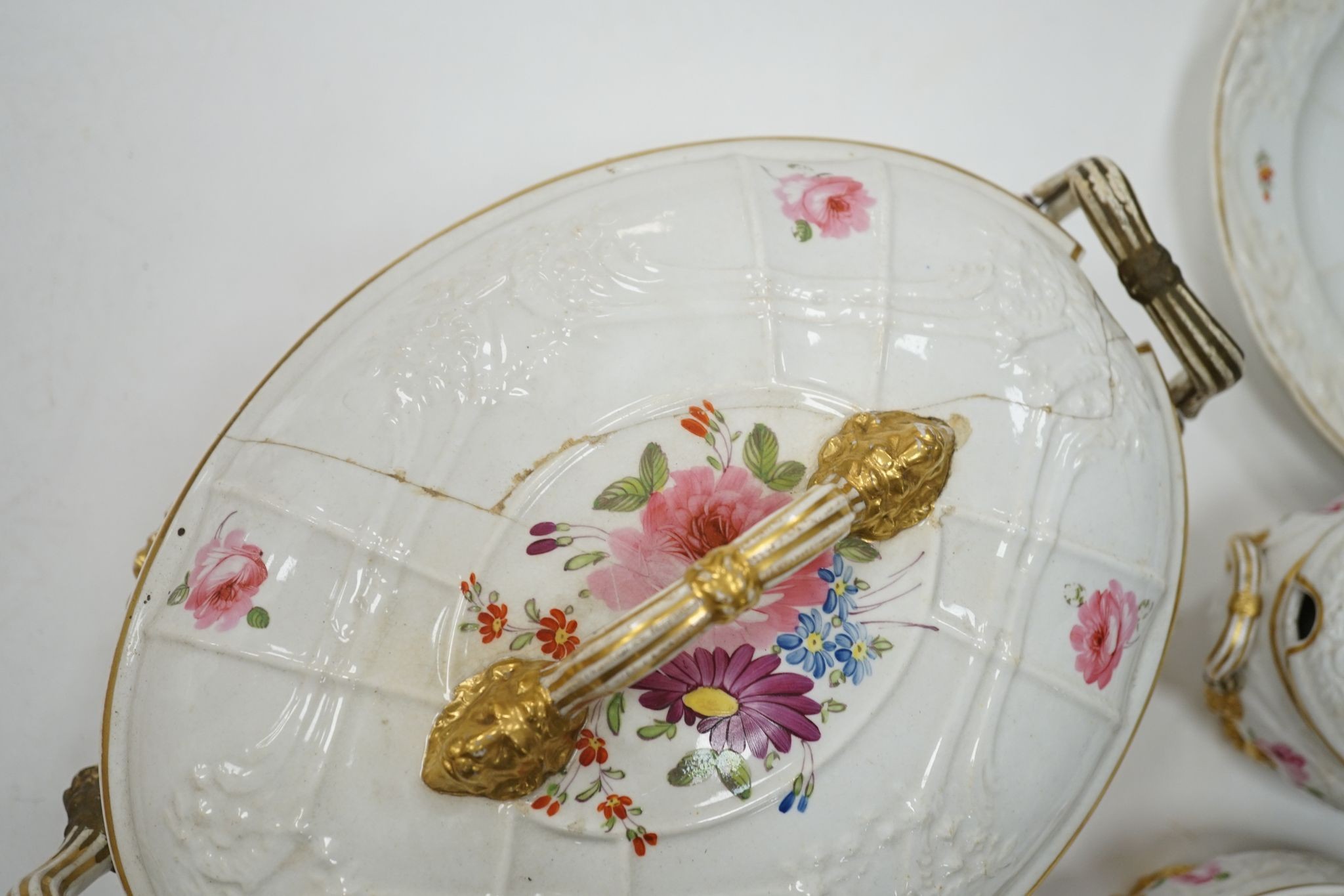 A 19th century floral painted part dinner service